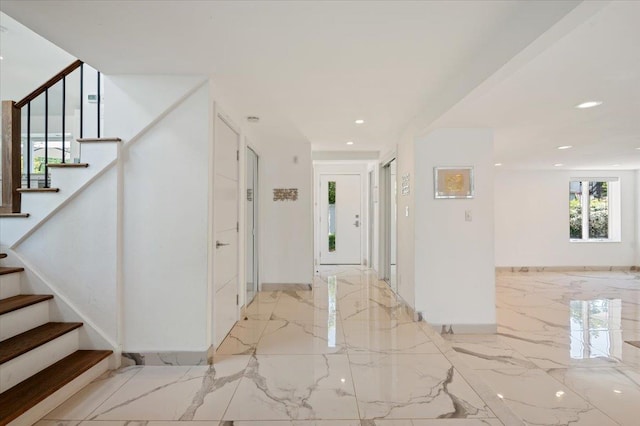 862 Fanwood Ave, North Woodmere, NY 11581 - hallway featuring marble tiled flooring, stairs, and recessed lighting
