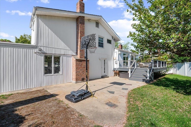 862 Fanwood Ave, North Woodmere, NY 11581 - back of house featuring a deck, a patio, a chimney, and stairs