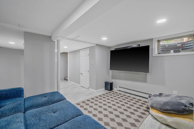 living room with a baseboard radiator, recessed lighting, wood finished floors, and baseboards