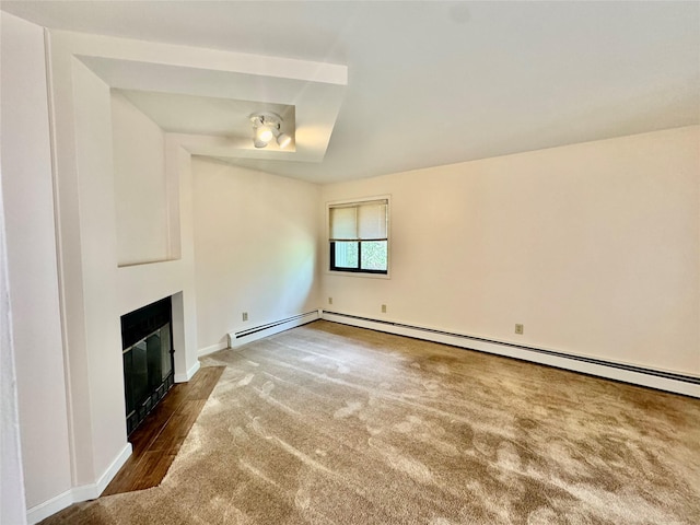 8 Ebury, Middletown, NY 10940 - unfurnished living room with a fireplace with flush hearth, baseboards, a baseboard radiator, and carpet flooring