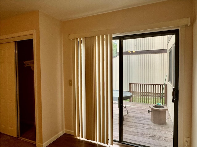8 Ebury, Middletown, NY 10940 - doorway featuring baseboards and wood finished floors
