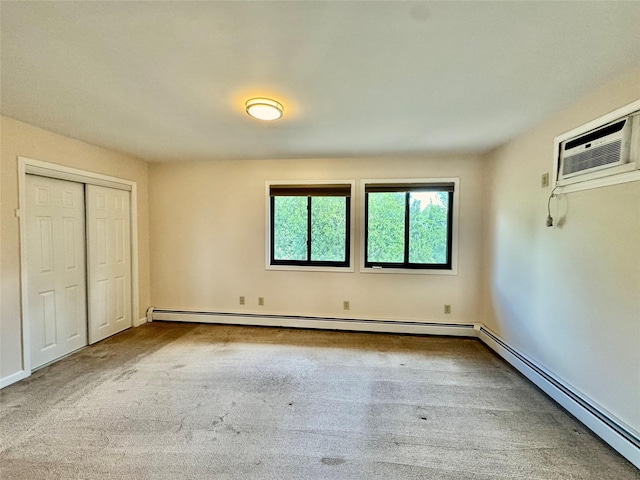 8 Ebury, Middletown, NY 10940 - unfurnished bedroom featuring baseboard heating, carpet floors, and a closet