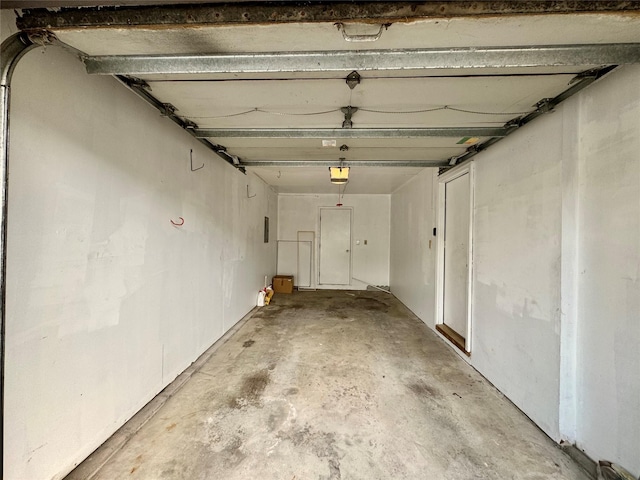 8 Ebury, Middletown, NY 10940 - garage featuring a garage door opener