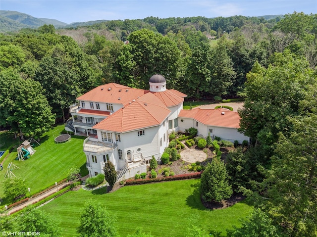 view from above of property featuring a forest