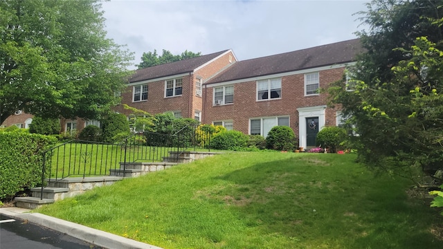 109 N Broadway Unit M12, White Plains, NY 10603 - colonial house with brick siding and a front yard