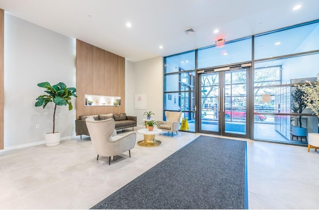 8808 Justice Ave Unit 16H, Elmhurst, NY 11373 - lobby featuring expansive windows and recessed lighting