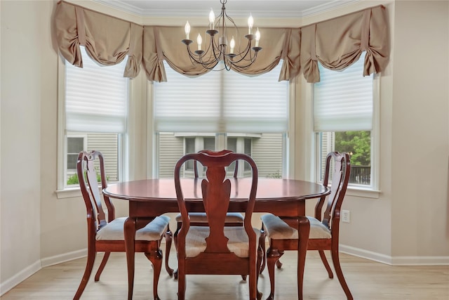701 Pheasant Woods Rd, Briarcliff Manor, NY 10510 - dining room with baseboards, light wood-style floors, a chandelier, and ornamental molding