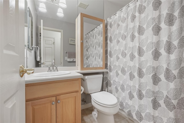 701 Pheasant Woods Rd, Briarcliff Manor, NY 10510 - full bath with toilet, tile patterned floors, vanity, and curtained shower