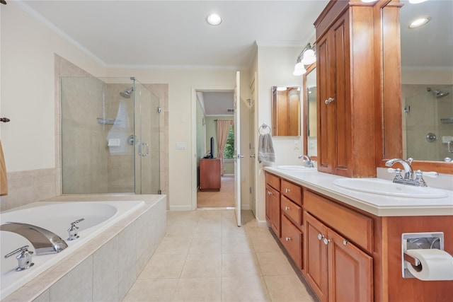 701 Pheasant Woods Rd, Briarcliff Manor, NY 10510 - full bathroom with a shower stall, a garden tub, ornamental molding, double vanity, and tile patterned floors