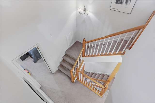 701 Pheasant Woods Rd, Briarcliff Manor, NY 10510 - stairway featuring carpet