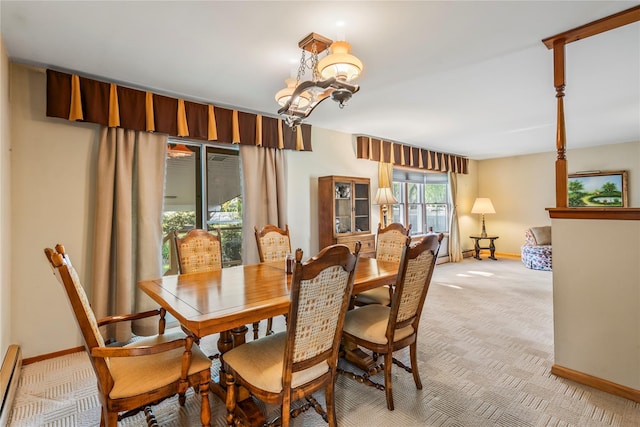 359 Old Bridge Rd, East Northport, NY 11731 - dining area featuring baseboards, a baseboard radiator, and light colored carpet
