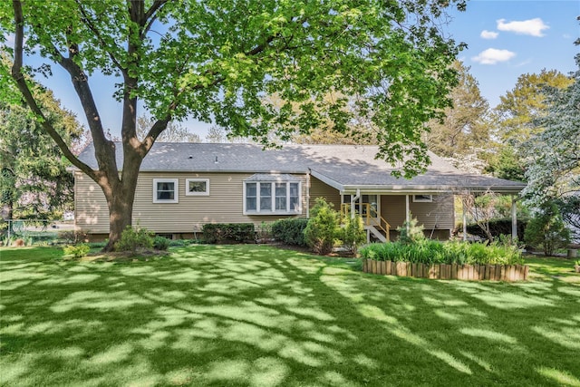 359 Old Bridge Rd, East Northport, NY 11731 - rear view of property featuring a yard
