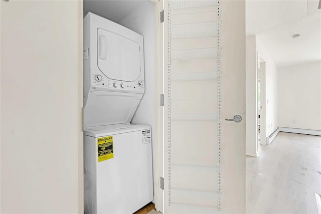 9305 37th Ave Unit 3D, Jackson Heights, NY 11372 - laundry room featuring stacked washing machine and dryer