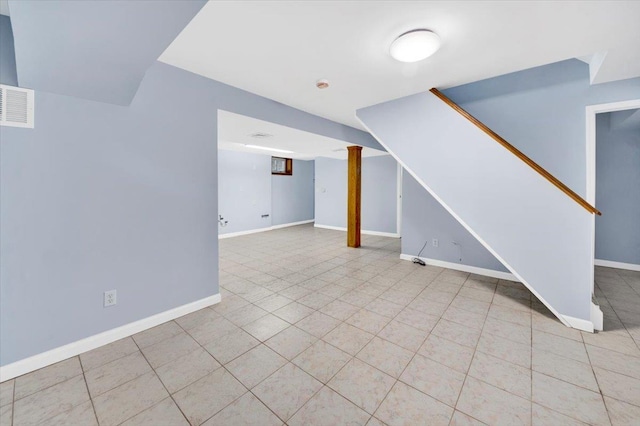 105 Colgate Ave, Yonkers, NY 10703 - unfurnished living room with baseboards, tile patterned flooring, and stairway