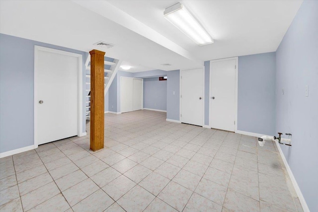 105 Colgate Ave, Yonkers, NY 10703 - finished basement with baseboards and light tile patterned floors