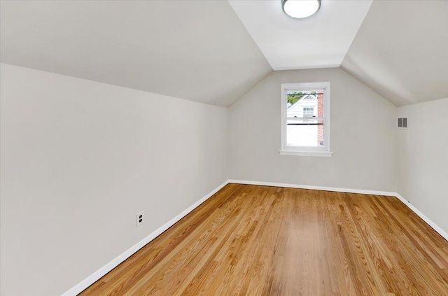 105 Colgate Ave, Yonkers, NY 10703 - bonus room with wood finished floors, baseboards, and vaulted ceiling
