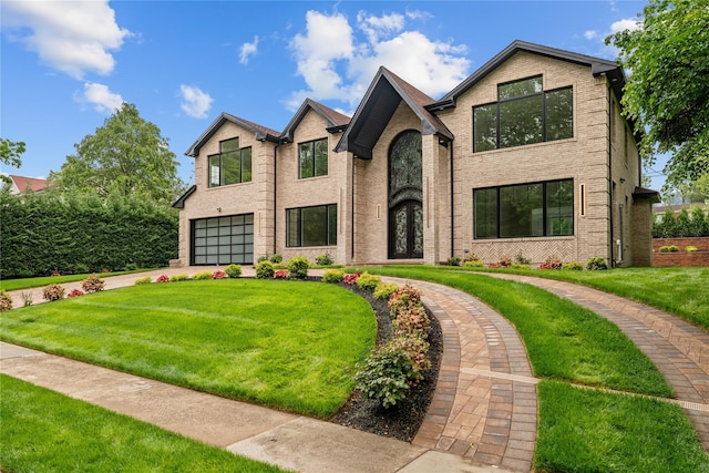46 Snapdragon Ln, Roslyn Heights, NY 11577 - view of front of house with a garage, driveway, brick siding, and a front yard