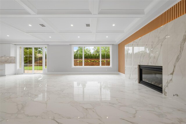 46 Snapdragon Ln, Roslyn Heights, NY 11577 - unfurnished living room featuring marble tiled floors, healthy amount of natural light, coffered ceiling, a fireplace, and recessed lighting