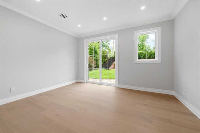 46 Snapdragon Ln, Roslyn Heights, NY 11577 - spare room featuring ornamental molding, plenty of natural light, light wood-style flooring, baseboards, and recessed lighting