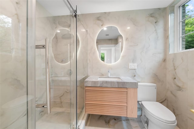 46 Snapdragon Ln, Roslyn Heights, NY 11577 - full bathroom with tile walls, marble tiled flooring, toilet, a marble finish shower, and vanity