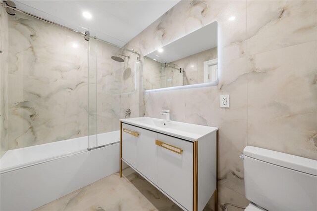 46 Snapdragon Ln, Roslyn Heights, NY 11577 - full bathroom featuring tile walls, toilet, marble finish floors, vanity, and enclosed tub / shower combo