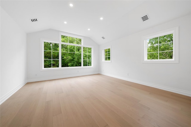 46 Snapdragon Ln, Roslyn Heights, NY 11577 - unfurnished room with baseboards, light wood-type flooring, recessed lighting, and lofted ceiling