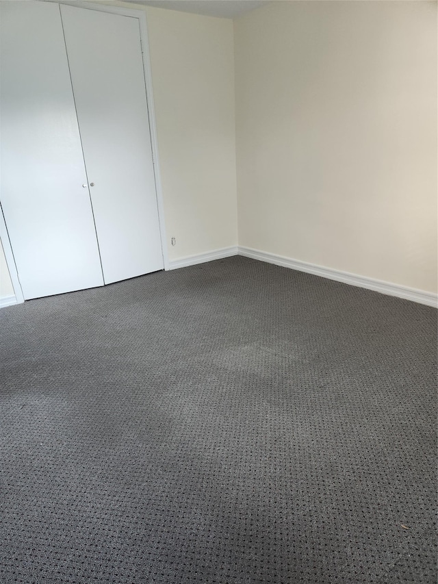 285 Central Ave Unit B4, Lawrence, NY 11559 - unfurnished bedroom featuring carpet floors and baseboards