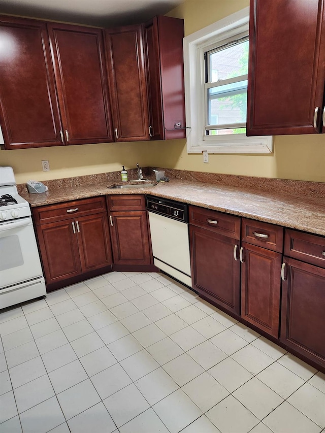 285 Central Ave Unit B4, Lawrence, NY 11559 - kitchen featuring white appliances, dark brown cabinets, and a sink