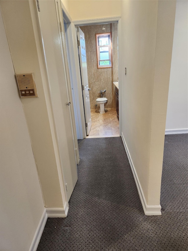285 Central Ave Unit B4, Lawrence, NY 11559 - hallway featuring carpet flooring and baseboards