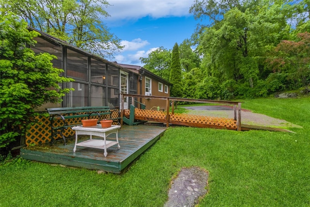 57 Empire Dr, Patterson, NY 12563 - view of green lawn with a deck