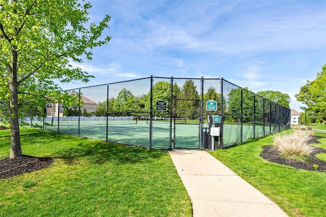 33 Avolet Ct, Mount Sinai, NY 11766 - view of tennis court with a gate