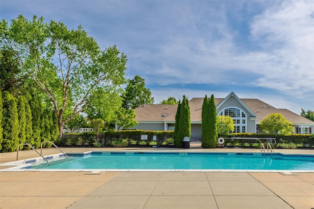 33 Avolet Ct, Mount Sinai, NY 11766 - community pool featuring a patio area