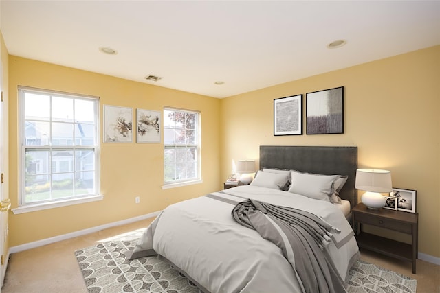 33 Avolet Ct, Mount Sinai, NY 11766 - bedroom with light colored carpet and baseboards