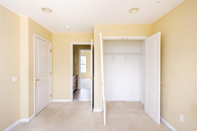 33 Avolet Ct, Mount Sinai, NY 11766 - unfurnished bedroom featuring a closet, baseboards, and recessed lighting