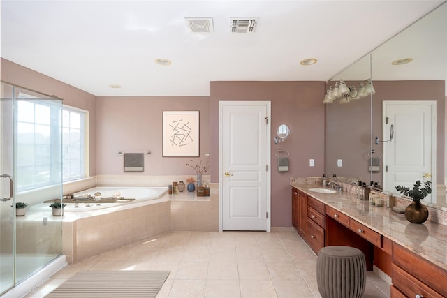 33 Avolet Ct, Mount Sinai, NY 11766 - full bath with vanity, tile patterned floors, a garden tub, a shower stall, and baseboards