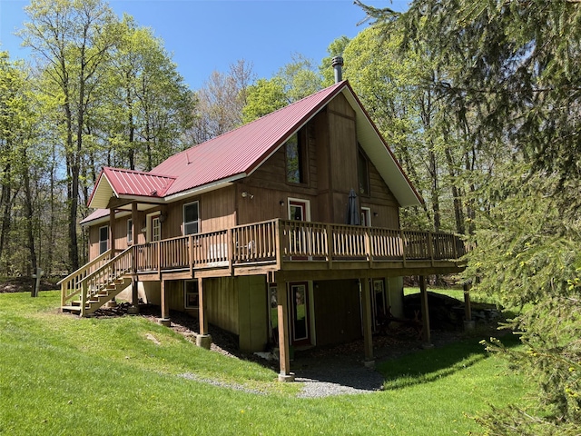 456 Anderson Rd, Parksville, NY 12768 - rear view of property with a lawn, a deck, metal roof, and stairway