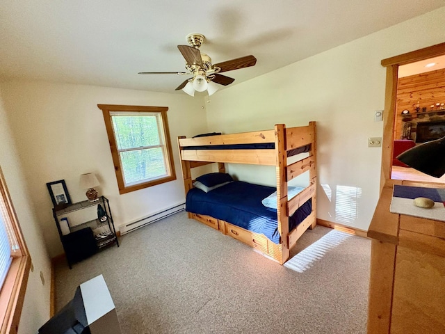 456 Anderson Rd, Parksville, NY 12768 - carpeted bedroom with baseboard heating, baseboards, and ceiling fan