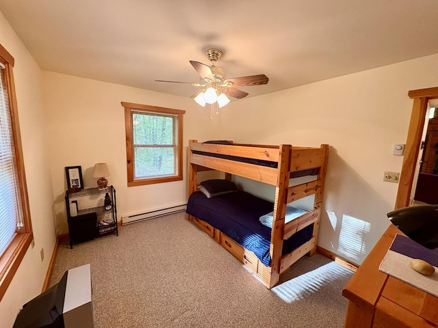 456 Anderson Rd, Parksville, NY 12768 - carpeted bedroom with baseboard heating and ceiling fan