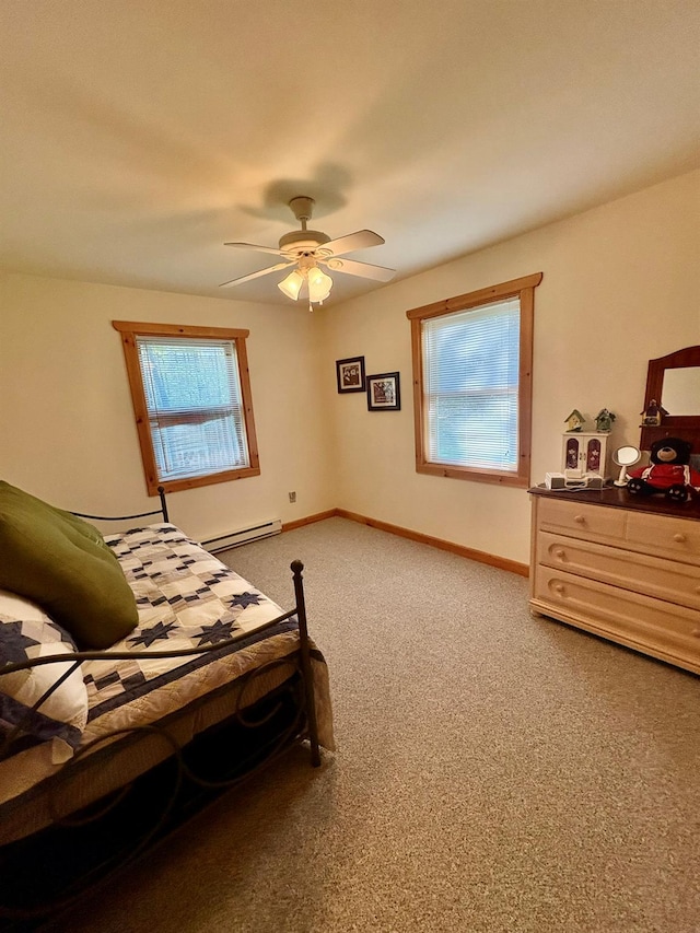 456 Anderson Rd, Parksville, NY 12768 - bedroom featuring multiple windows, light carpet, baseboard heating, and baseboards