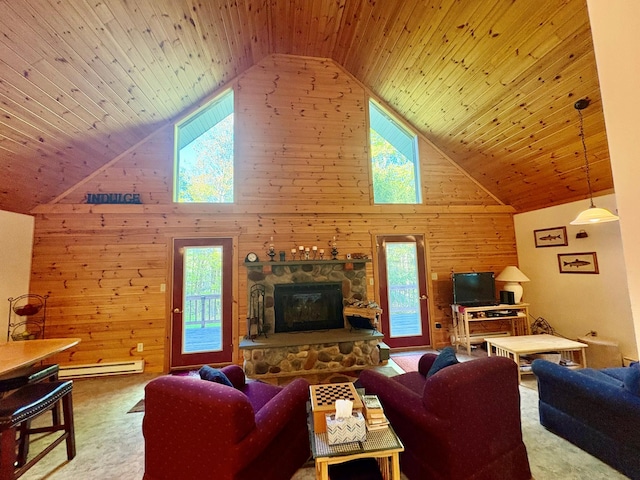 456 Anderson Rd, Parksville, NY 12768 - living area with high vaulted ceiling, wooden walls, wooden ceiling, a stone fireplace, and a baseboard heating unit