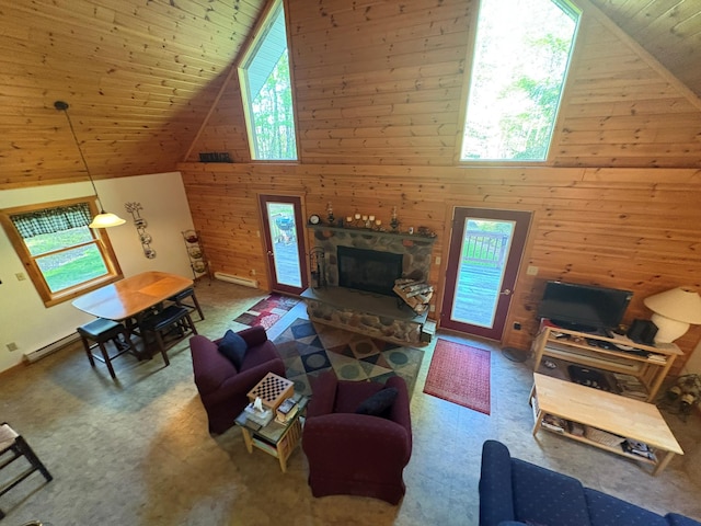 456 Anderson Rd, Parksville, NY 12768 - living room with high vaulted ceiling, plenty of natural light, wooden walls, wooden ceiling, and a baseboard heating unit