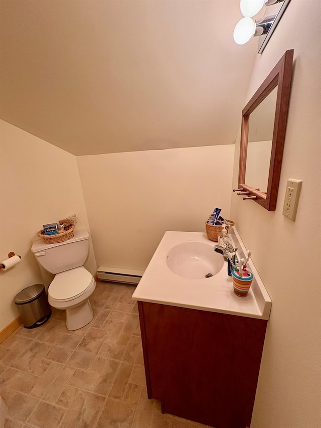456 Anderson Rd, Parksville, NY 12768 - half bath with a baseboard radiator, vanity, lofted ceiling, and toilet