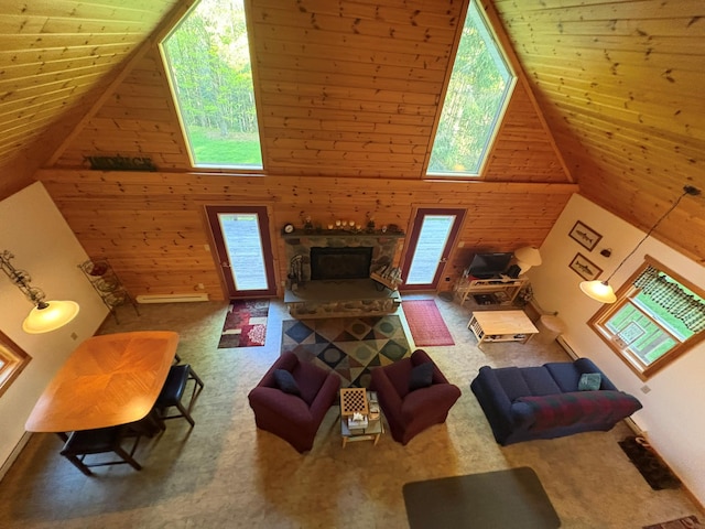 456 Anderson Rd, Parksville, NY 12768 - carpeted living room featuring wood walls, high vaulted ceiling, wooden ceiling, and a fireplace