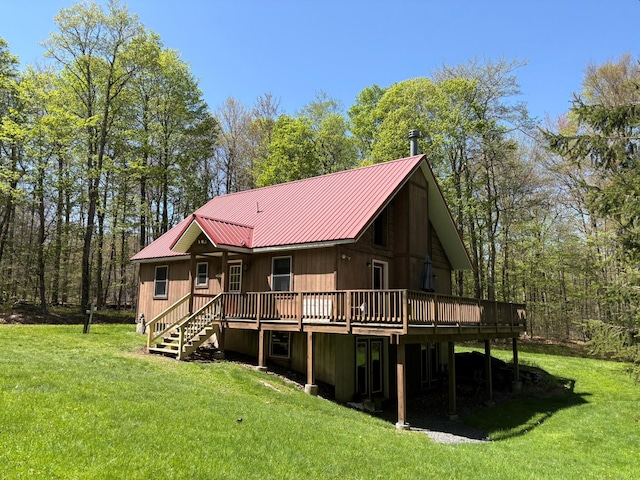 456 Anderson Rd, Parksville, NY 12768 - rear view of property with a deck, a lawn, and metal roof