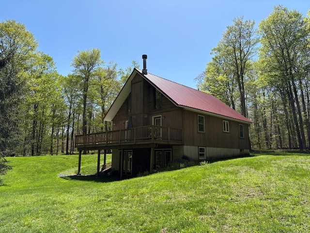 456 Anderson Rd, Parksville, NY 12768 - rear view of house with a deck, a yard, and metal roof