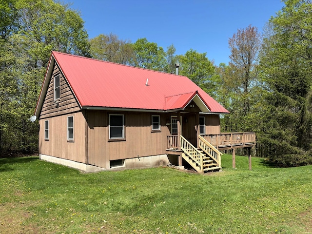 456 Anderson Rd, Parksville, NY 12768 - back of property featuring a yard, a deck, and metal roof