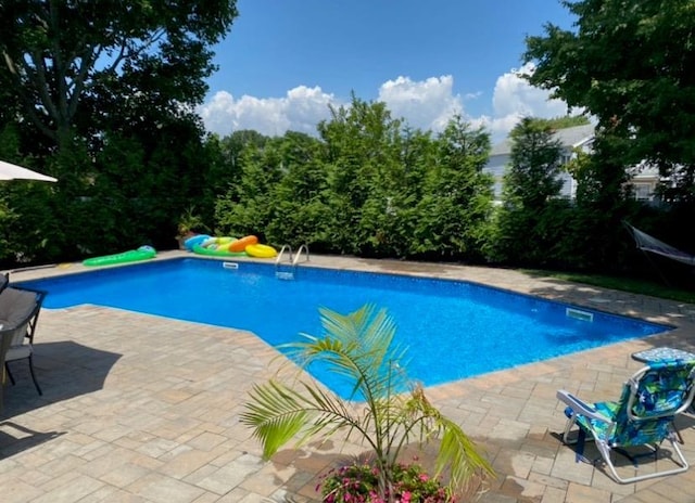 184 Dorothy Rd, West Islip, NY 11795 - swimming pool with a patio area