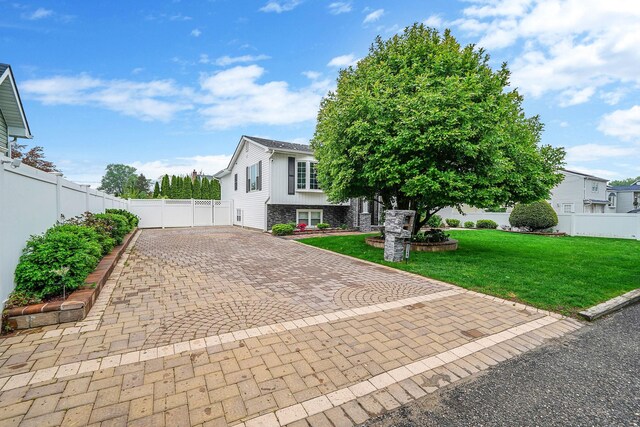 248 44th St, Lindenhurst, NY 11757 - view of front of property featuring decorative driveway