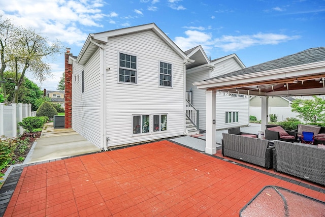 248 44th St, Lindenhurst, NY 11757 - back of house featuring a patio, an outdoor hangout area, a gazebo, and stairs
