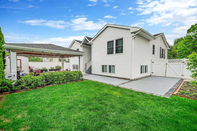 248 44th St, Lindenhurst, NY 11757 - rear view of house featuring a gate, a patio, and a gazebo